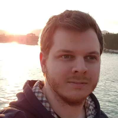 Thomas Müller by the sea at sunset